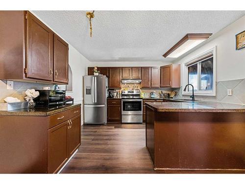 81 Castleglen Road Ne, Calgary, AB - Indoor Photo Showing Kitchen With Stainless Steel Kitchen