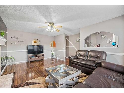 81 Castleglen Road Ne, Calgary, AB - Indoor Photo Showing Living Room