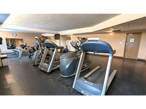 1110-738 3 Avenue Sw, Calgary, AB - Indoor Photo Showing Gym Room