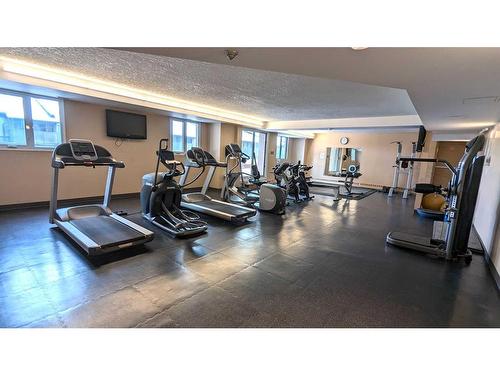 1110-738 3 Avenue Sw, Calgary, AB - Indoor Photo Showing Gym Room