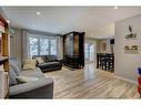 7-10001 Brookpark Boulevard Sw, Calgary, AB  - Indoor Photo Showing Living Room 