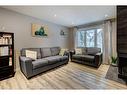 7-10001 Brookpark Boulevard Sw, Calgary, AB  - Indoor Photo Showing Living Room 