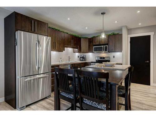 7-10001 Brookpark Boulevard Sw, Calgary, AB - Indoor Photo Showing Kitchen With Stainless Steel Kitchen