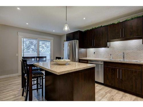 7-10001 Brookpark Boulevard Sw, Calgary, AB - Indoor Photo Showing Kitchen With Stainless Steel Kitchen With Double Sink