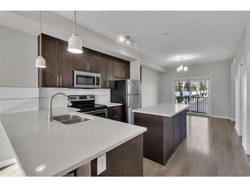 131 Redstone Circle Ne, Calgary, AB - Indoor Photo Showing Kitchen With Stainless Steel Kitchen With Double Sink With Upgraded Kitchen