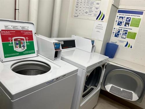 412-221 6 Avenue Se, Calgary, AB - Indoor Photo Showing Laundry Room