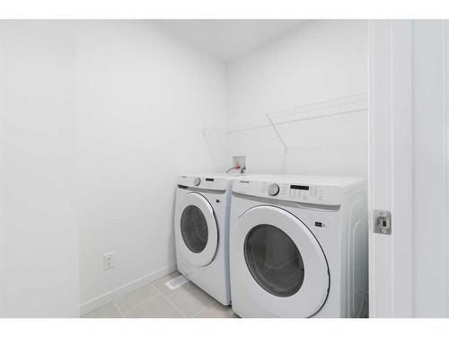 317 Belmont Park Sw, Calgary, AB - Indoor Photo Showing Laundry Room