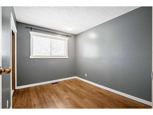 15 Alcock Close, Okotoks, AB - Indoor Photo Showing Other Room