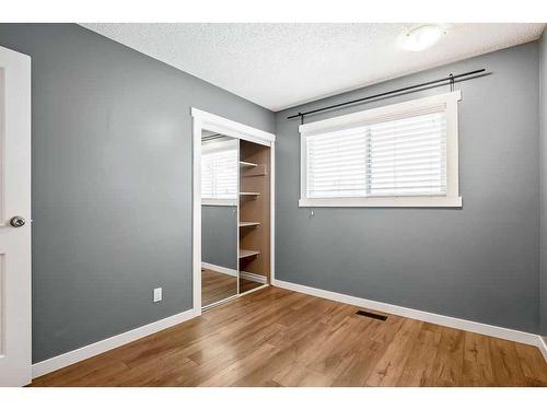 15 Alcock Close, Okotoks, AB - Indoor Photo Showing Other Room