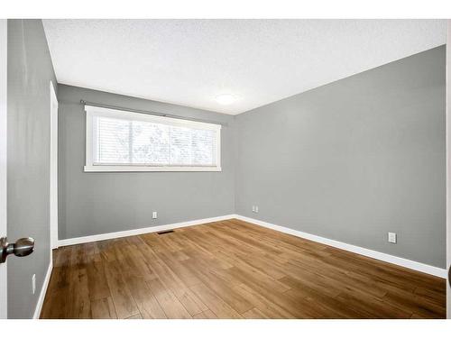 15 Alcock Close, Okotoks, AB - Indoor Photo Showing Other Room