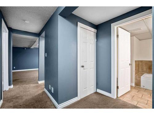 15 Alcock Close, Okotoks, AB - Indoor Photo Showing Other Room