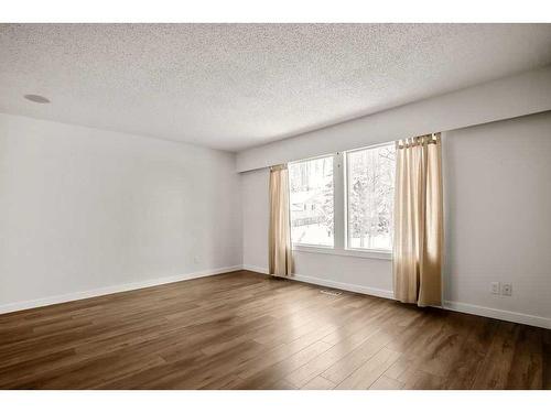 15 Alcock Close, Okotoks, AB - Indoor Photo Showing Other Room