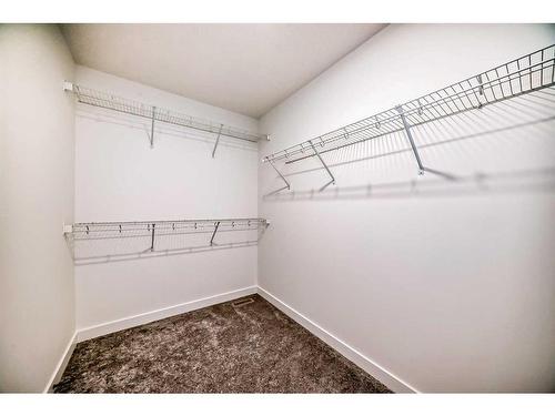 27 Saddlebred Place, Cochrane, AB - Indoor With Storage