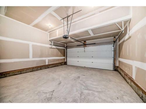 27 Saddlebred Place, Cochrane, AB - Indoor Photo Showing Garage