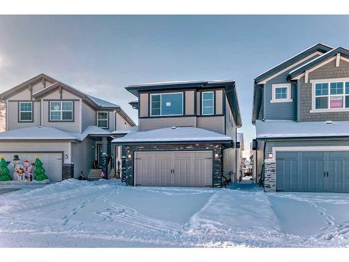 27 Saddlebred Place, Cochrane, AB - Outdoor With Facade