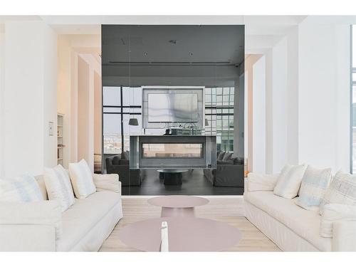 501-615 6 Avenue Se, Calgary, AB - Indoor Photo Showing Living Room With Fireplace