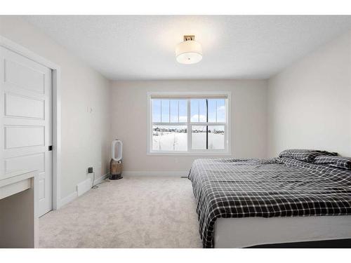 254 Alpine Boulevard Sw, Calgary, AB - Indoor Photo Showing Bedroom