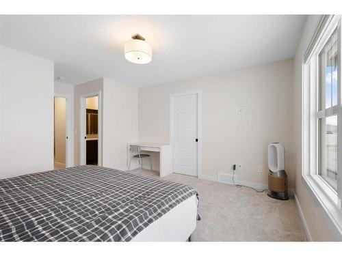 254 Alpine Boulevard Sw, Calgary, AB - Indoor Photo Showing Bedroom