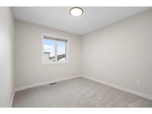 254 Alpine Boulevard Sw, Calgary, AB - Indoor Photo Showing Other Room