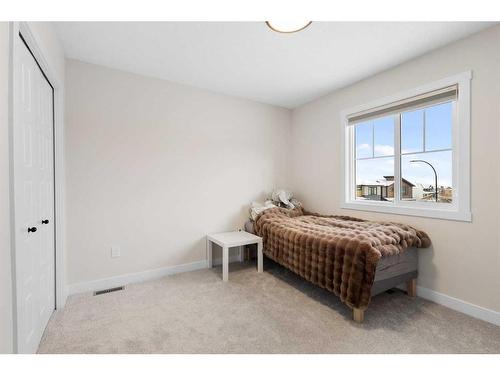 254 Alpine Boulevard Sw, Calgary, AB - Indoor Photo Showing Bedroom