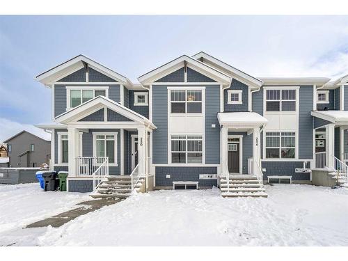 254 Alpine Boulevard Sw, Calgary, AB - Outdoor With Facade