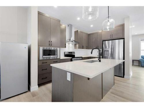 254 Alpine Boulevard Sw, Calgary, AB - Indoor Photo Showing Kitchen With Stainless Steel Kitchen With Upgraded Kitchen