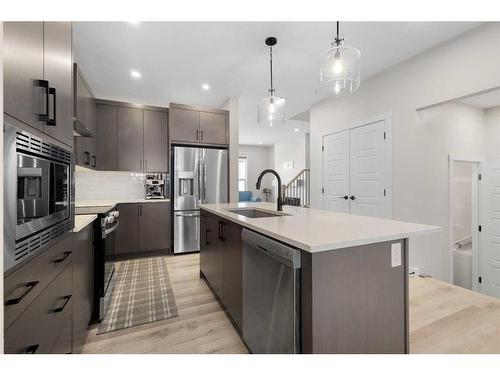 254 Alpine Boulevard Sw, Calgary, AB - Indoor Photo Showing Kitchen With Stainless Steel Kitchen With Upgraded Kitchen