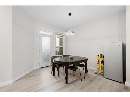 254 Alpine Boulevard Sw, Calgary, AB - Indoor Photo Showing Dining Room