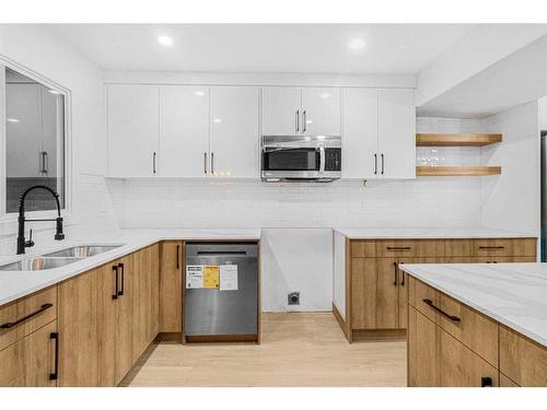 414 Templeview Drive Ne, Calgary, AB - Indoor Photo Showing Kitchen With Double Sink