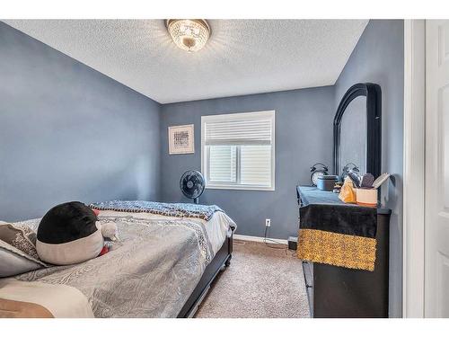 127 Brightoncrest Rise Se, Calgary, AB - Indoor Photo Showing Bedroom