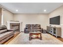 127 Brightoncrest Rise Se, Calgary, AB  - Indoor With Fireplace 