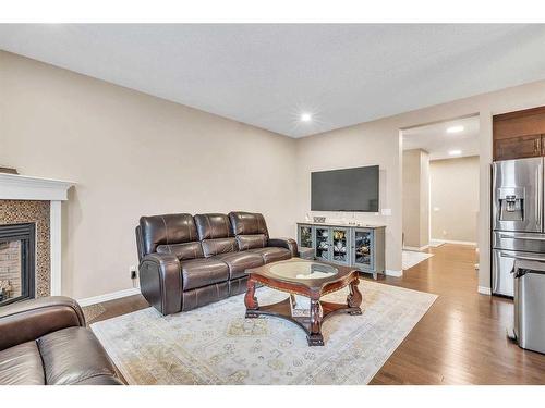 127 Brightoncrest Rise Se, Calgary, AB - Indoor Photo Showing Living Room With Fireplace