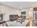 127 Brightoncrest Rise Se, Calgary, AB  - Indoor Photo Showing Living Room With Fireplace 