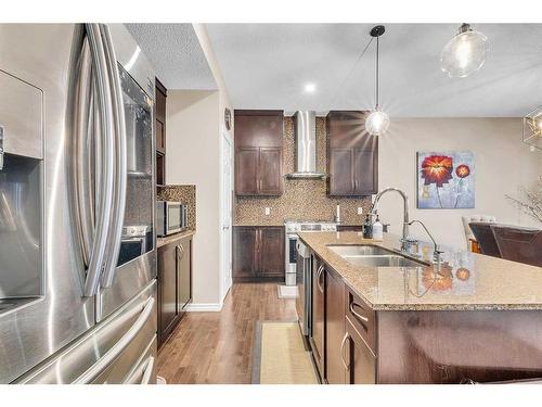 127 Brightoncrest Rise Se, Calgary, AB - Indoor Photo Showing Kitchen With Stainless Steel Kitchen With Double Sink With Upgraded Kitchen