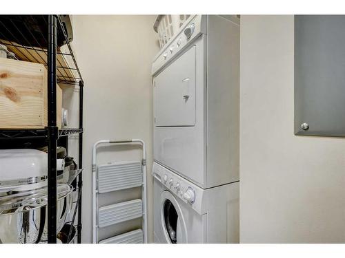 224-15 Sunset Square, Cochrane, AB - Indoor Photo Showing Laundry Room