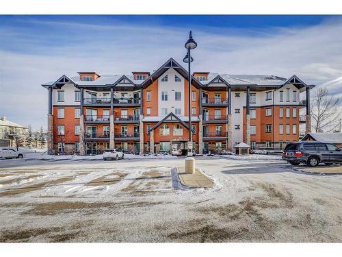 224-15 Sunset Square, Cochrane, AB - Outdoor With Facade