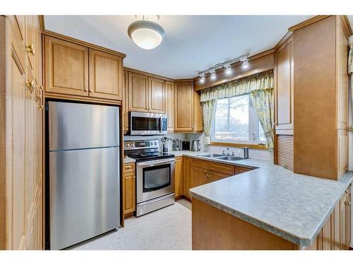 3410 Breton Close Nw, Calgary, AB - Indoor Photo Showing Kitchen With Stainless Steel Kitchen With Double Sink