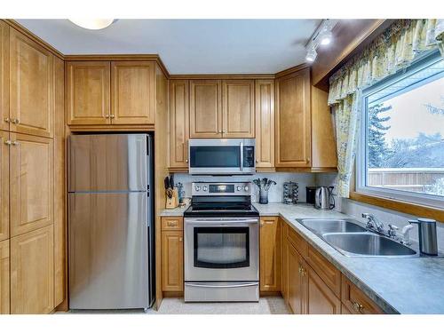 3410 Breton Close Nw, Calgary, AB - Indoor Photo Showing Kitchen With Stainless Steel Kitchen With Double Sink