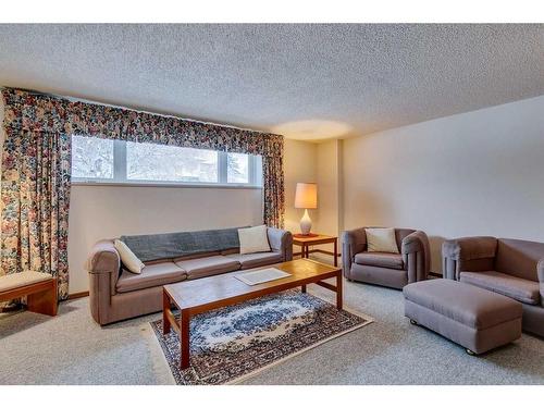 3410 Breton Close Nw, Calgary, AB - Indoor Photo Showing Living Room