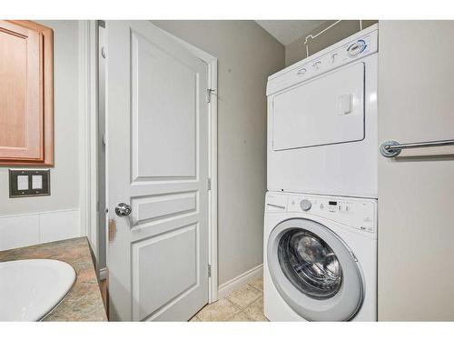 46 Tucker Circle, Okotoks, AB - Indoor Photo Showing Laundry Room