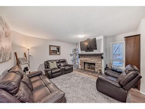 1 Harvest Oak View Ne, Calgary, AB - Indoor Photo Showing Living Room With Fireplace