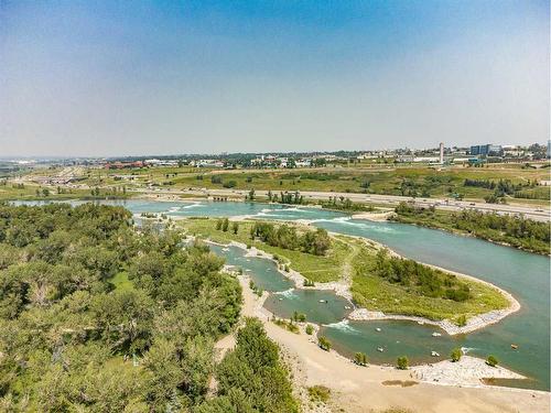 105-1408 17 Street Se, Calgary, AB - Outdoor With Body Of Water With View