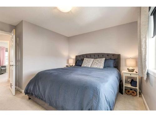 1233 New Brighton Drive Se, Calgary, AB - Indoor Photo Showing Bedroom