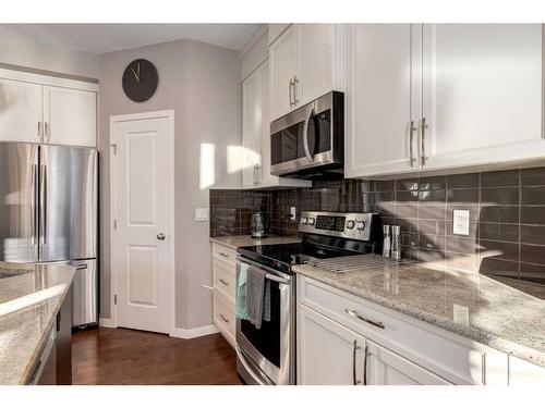 175 Cranford Green Se, Calgary, AB - Indoor Photo Showing Kitchen With Upgraded Kitchen