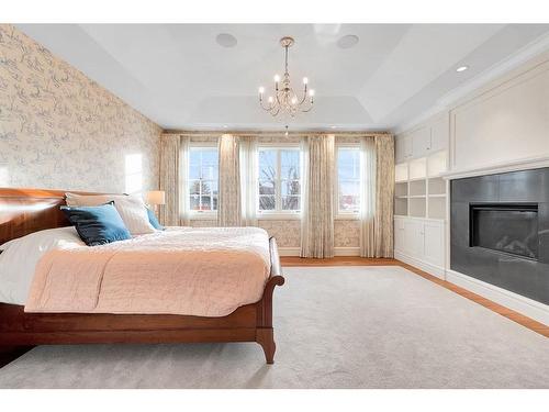 1607 42 Avenue Sw, Calgary, AB - Indoor Photo Showing Bedroom With Fireplace