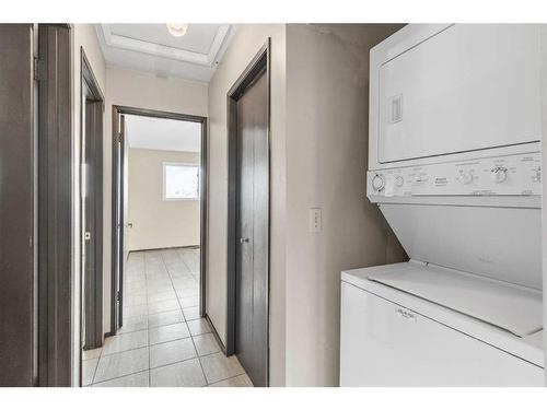 305 Templemont Place Ne, Calgary, AB - Indoor Photo Showing Laundry Room