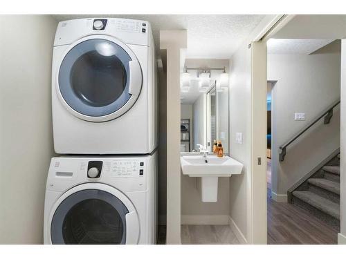 39 Chaparral Valley Way Se, Calgary, AB - Indoor Photo Showing Laundry Room