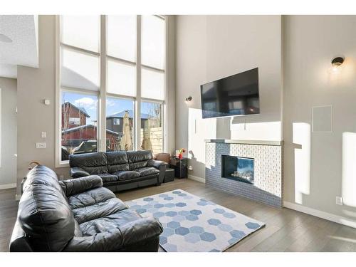 39 Chaparral Valley Way Se, Calgary, AB - Indoor Photo Showing Living Room With Fireplace