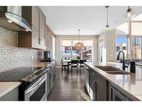 39 Chaparral Valley Way Se, Calgary, AB - Indoor Photo Showing Kitchen With Stainless Steel Kitchen With Double Sink With Upgraded Kitchen