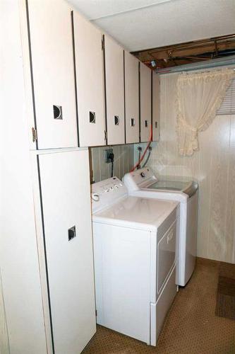 4032 Marbank Drive Ne, Calgary, AB - Indoor Photo Showing Laundry Room